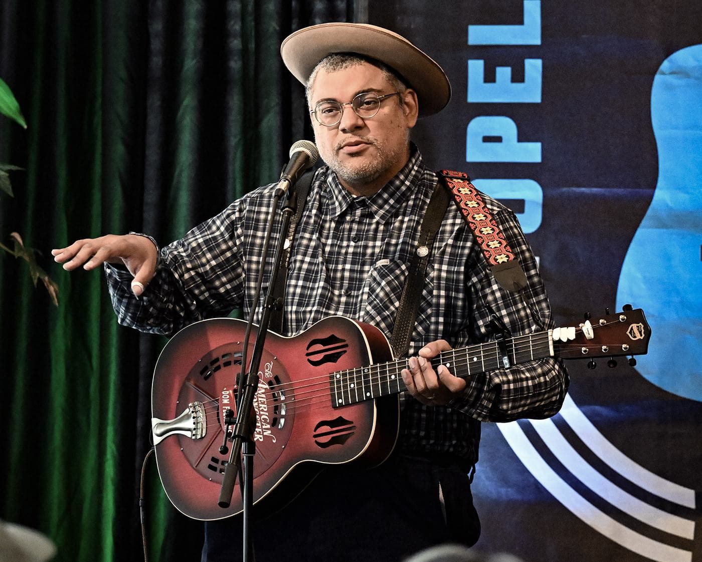 Dom Flemons performs at Heritage House during the Opelika Songwriters Festival