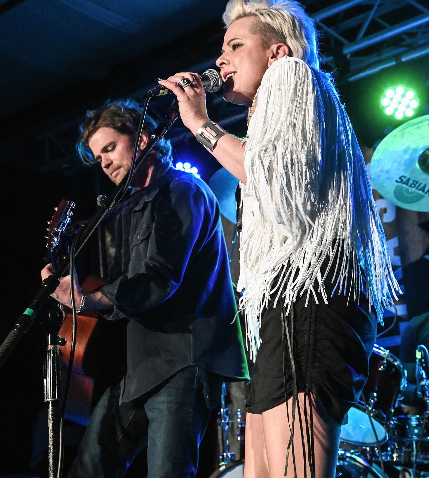 Jen Slocumb and Rob Slocumb of Martha's Trouble perform during Larry Mitchell's Late Night Jam at John Emerald Distilling Company during the Opelika Songwriters Festival