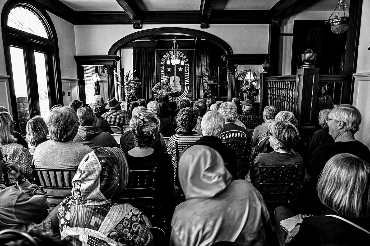 Dom Flemons performs at Heritage House during the Opelika Songwriters Festival