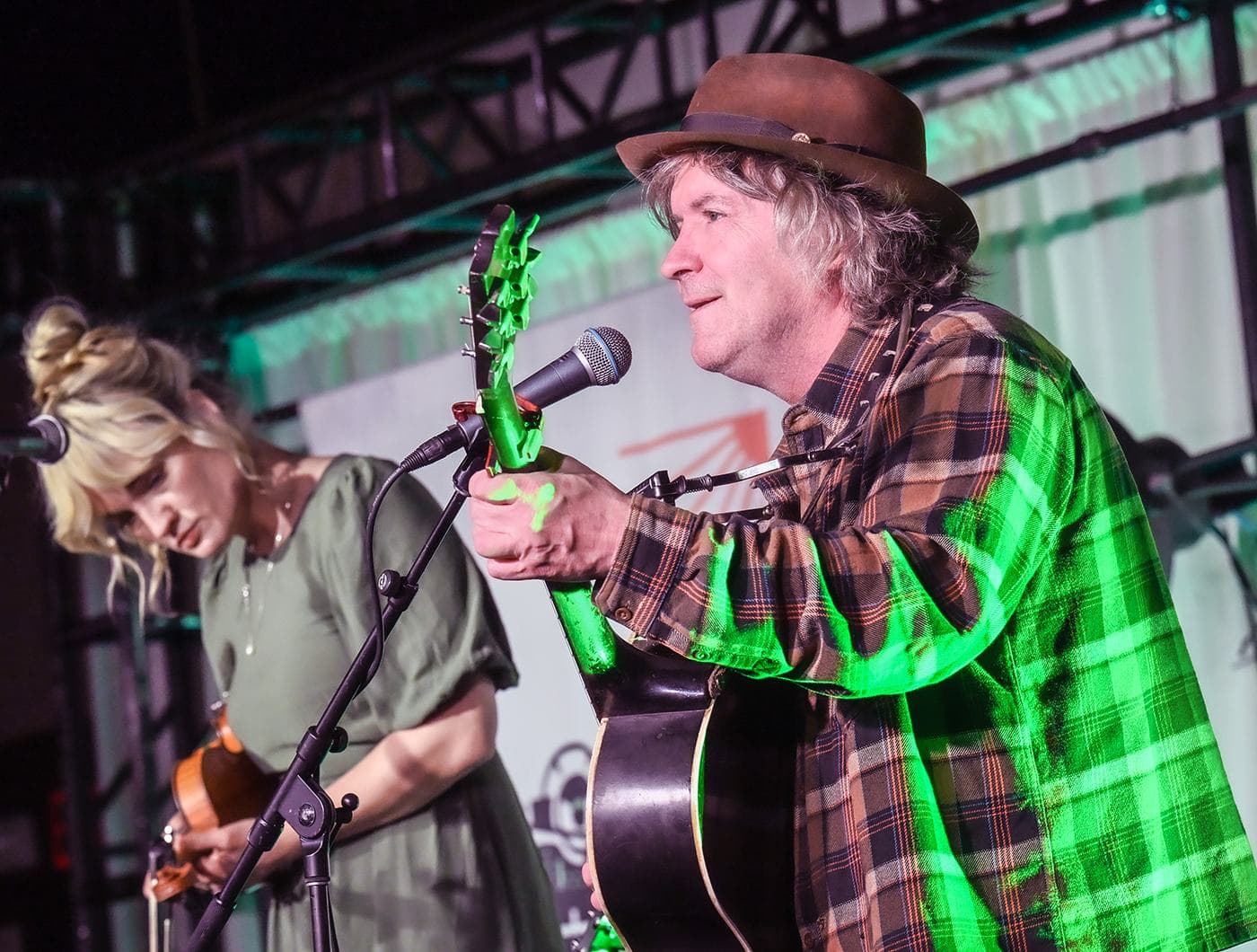 Jessica Wills Fisher and Tim Easton perform at The Bottling Plant Ballroom during the Opelika Songwriters Festival
