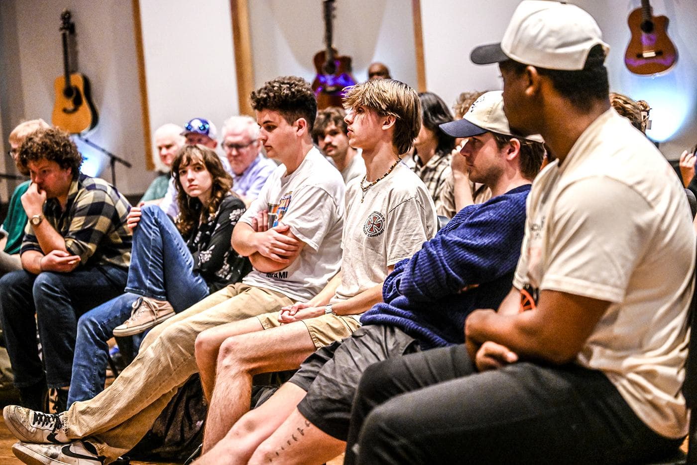 Music students listening during a visit from guitarist Allen Hinds at Lucky Man Studio, Auburn University